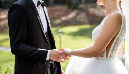 bride and groom holding hands, ceremony