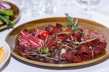 food on the table in restaurant, salad with meat