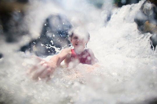 Boy enjoying in Bua Thong Waterfalls