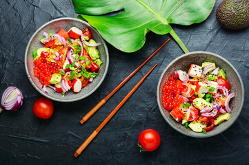 Asian salad of fish caviar,crab meat and avocado