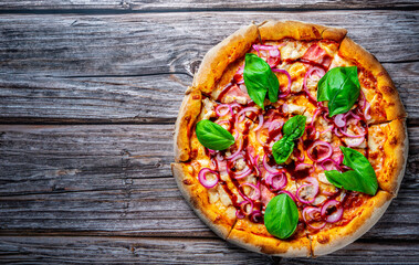 Pizza with chicken and barbeque sauce . Italian pizza on wooden table background