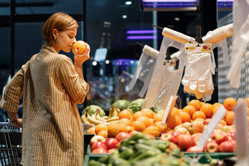  young girl are shopping at a supermarket