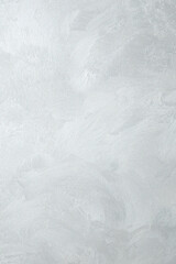 Decorative plaster. Grey wall texture background. Concrete style. Restoration indoors. Maintenance works.