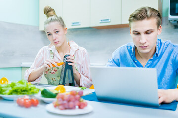 A quarrel and abuse of a young family in the kitchen