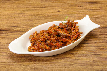 Canned anchovy in tomato sauce