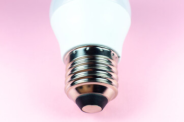 Saving energy modern led lamp on a pink background