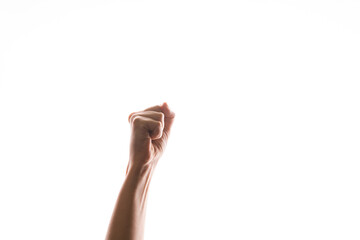 Hand gestures. woman's fist stretches up, a symbol of the struggle for rights and dissent,