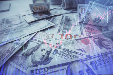 Multi exposure of forex chart drawing over us dollars bill background. Concept of financial success...