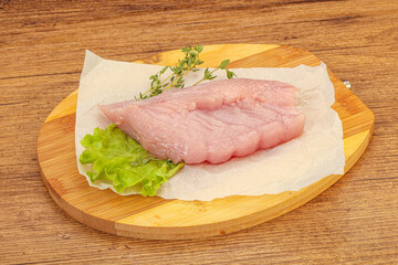 Raw turkey breast steak for cooking