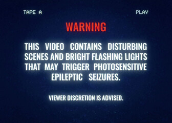 Obraz premium An old VHS tape (recreated with noise and distortion) with a warning message about disturbing scenes and bright flashing light (triggering epileptic seizures). 