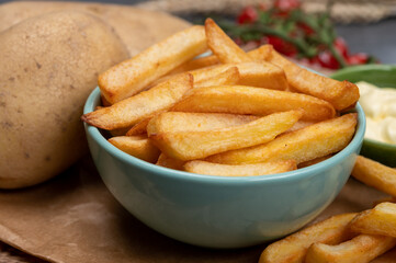 Bown with fresh cooked french fries potato chips with belgian mayonnaise sauce