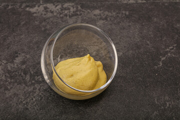 Dijon mustard sauce in the bowl