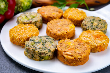 Small tasty vegan and vegetarian burgers made from fresh vegetables and dried legumes and beans