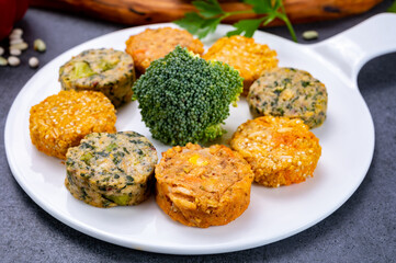 Small tasty vegan and vegetarian burgers made from fresh vegetables and dried legumes and beans