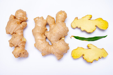 Fresh ginger rhizome root used in traditional medicines and for flavoring meals isolated on white