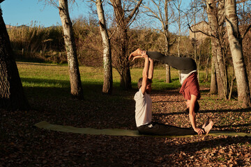 couple practicing yoga, square pose