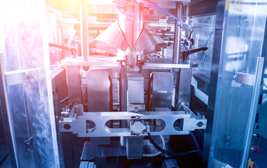 Vertical multi-head weigher packaging machine snacks and chips in a factory