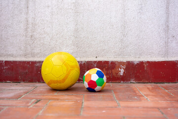 Childhood - Street football: football & child ball at the playground