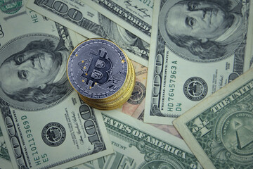 golden shining bitcoins with flag of alaska state on a dollar money background.