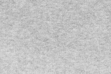 White natural texture of knitted wool textile material background. White crochet cotton fabric woven canvas texture. close up