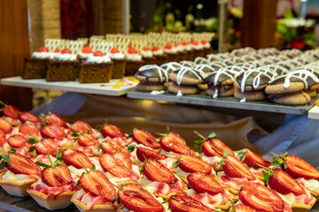 Open buffet full of delicious fruits with orange, grape, watermelon