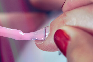 Close-up of a nail polish job with women hands