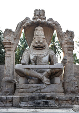 stone carved statute of the Hindu god Vishnu in his Narsimha avatar, that is half lion and half man in Hampi.