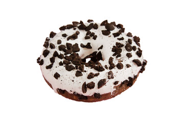 Round donut with chocolate crumbs and white icing isolated on a white background. The concept of junk food