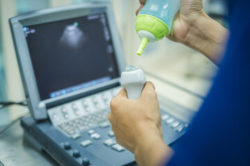 Doctor is examining heart's patient by echocardiogram for diagnosis disease or explain symptom. Medical exam , ultrasound. Medical equipment.