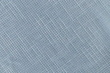 Fototapeta na wymiar light blue dense fabric with a relief, background, texture