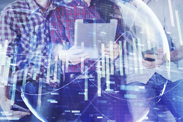 Double exposure of business theme drawing and man and woman working together holding and using a mobile device.