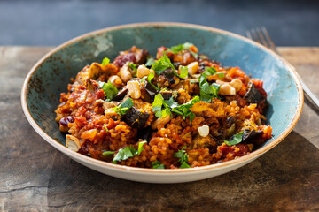 Bulgur wheat tagine with aubergine and cashew nuts