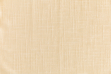 Fototapeta na wymiar yellow dense fabric with a relief, background, texture