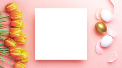 Easter card. Golden, white colour egg in basket with spring tulips, feathers on pastel pink background in Happy Easter decoration. Flat lay, top view with copy space.