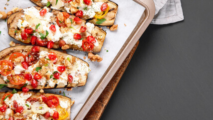 Fresh baked eggplants with walnuts and pomegranate. Delicious summer snack