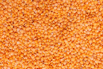 Natural organic red lentils for healthy food. background texture