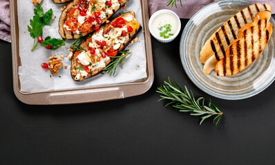 Fresh baked eggplants with walnuts and pomegranate. Delicious summer snack
