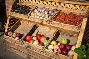 dried fruits in baskets on the showcase