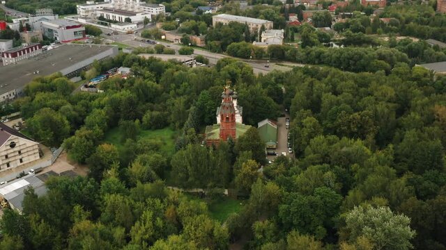 Aerial View Of The Christian Church In The Middle Of The Forest. Beautiful Aerial Shots Of Architecture