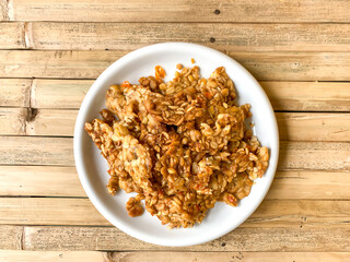 fried tempeh in a white plate