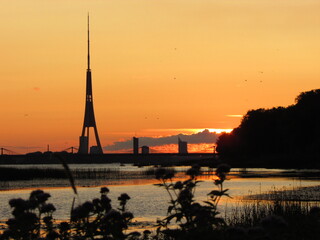 Fototapeta na wymiar sunset on the river Daugava, Riga