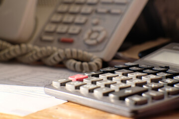 close up of a person using a calculator