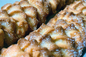 Delicious shortbread cookies with powdered sugar in a package.