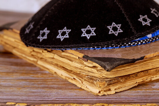 Orthodox Jewish prays shawl tallit and kippa jewish religious symbol