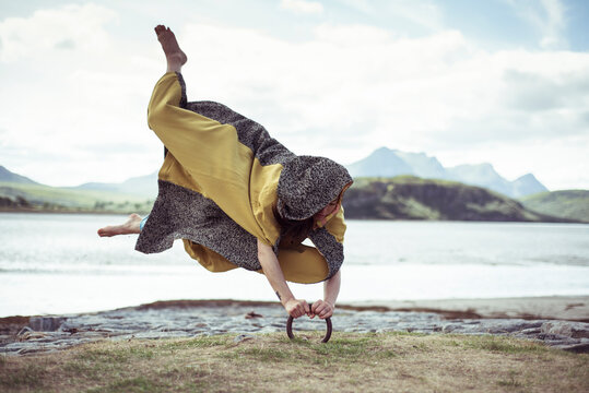 dancer appears to levitate grips to ground