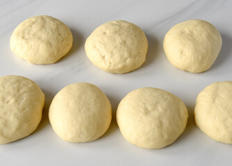 Fototapeta na wymiar rwa rolls (dough) on board