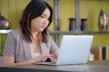 Asian woman working with computer laptop