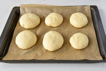 rwa rolls (dough) on board