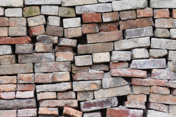 Pile of old used clay bricks