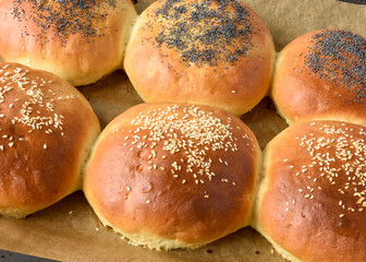 fresh baked buns with sesame and poppy  seeds